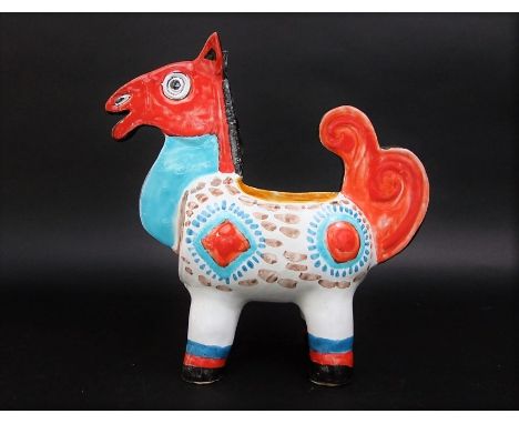 An unusual mid 20th century Italian ceramic planter in the form of a brightly decorated horse with painted mark Simone, Italy