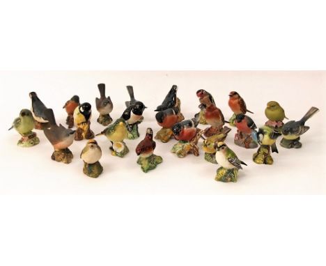 A collection of twenty various Beswick models of birds, together with two Royal Worcester birds and an Aynsley greenfinch