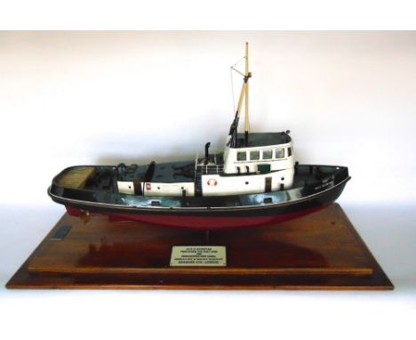 Good quality scale model of a tug boat under a glass cover with stepped square base, with plaque inscribed "M.S.C.Scimitar, T