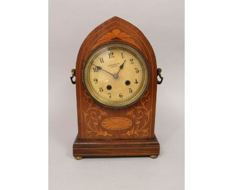 Edwardian walnut and box wood inlaid two train lancet mantle clock, the circular dial inscribed L Courlandr of Croydon, strik