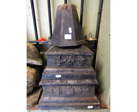 Three reclaimed cast iron drain water hoppers of varying size, two with foliate relief detail, together with a small galvanis