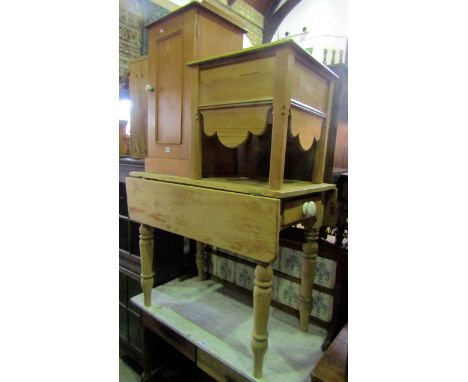 A Victorian stripped pine Pembroke table with frieze drawer, raised on four partially ring turned tapered legs, together with