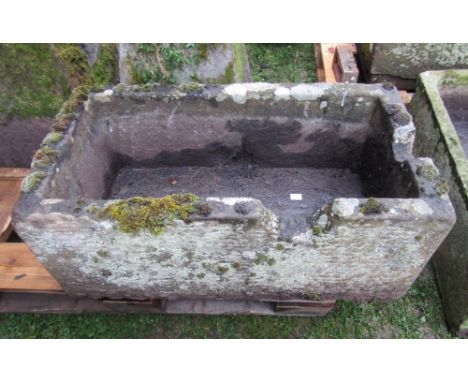 A good natural stone trough of rectangular form with two channels, 86cm long x 46cm wide x 36cm high approx