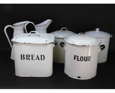 A collection of antique enamel to include four bread/flour bins, three tall jugs and a pail