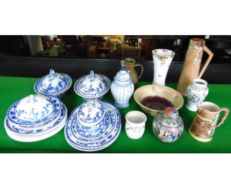 A collection of 19th century Minton's blue and white printed dinner wares in the Delft pattern comprising two oval tureens an