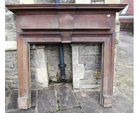 A reclaimed oak fire surround or chimney piece with moulded and dentil detail, the mantle 152 cm long, the insert 100 cm  x 9