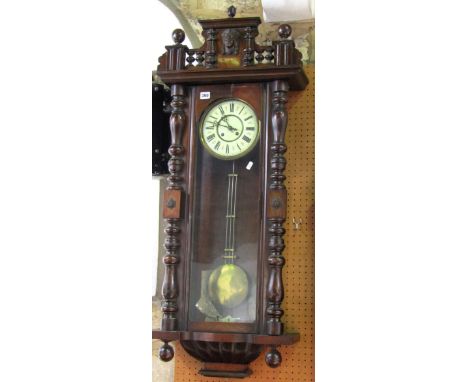 Vienna style regulator wall clock with two train enamel dial with Roman numerals to the chapter ring, 110 cm high