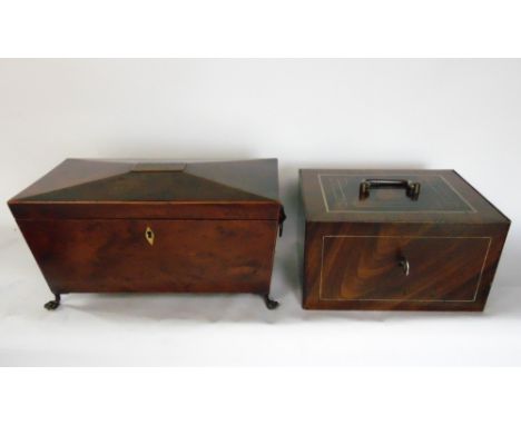 A 19th century Yew wood sarcophagus tea caddy, the hinged lid enclosing a full fitted interior with mixing glass upon four br