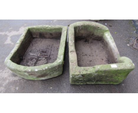 A small natural stone trough of rectangular form with single D end together with one other, 56 cm long x 40 cm wide x 20 cm i