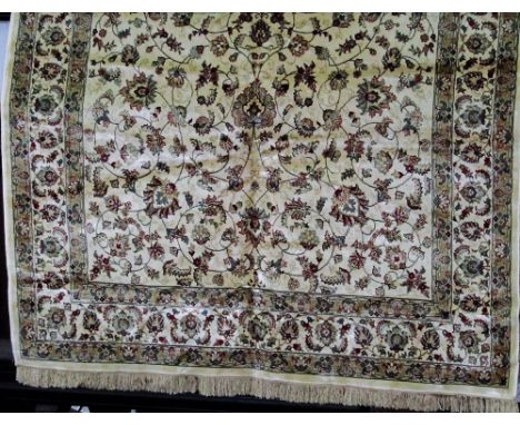 Kashmir carpet with scrolled floral design, ivory ground, 300 x 200 cm 