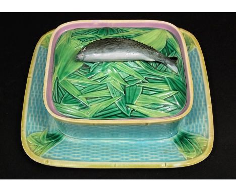 A 19th century majolica sardine dish and cover, probably by George Jones with naturalistically modelled fish cover, simulated