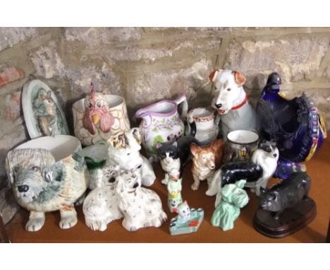 A collection of ceramic models of dogs and other animals including a pair of Beswick Staffordshire style spaniels, impressed 