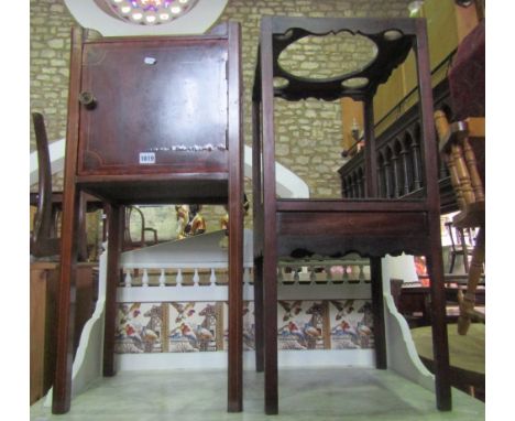 A Georgian mahogany tray top pot cupboard of square cut form with pierced handles, box wood stringing and satin cross banded 