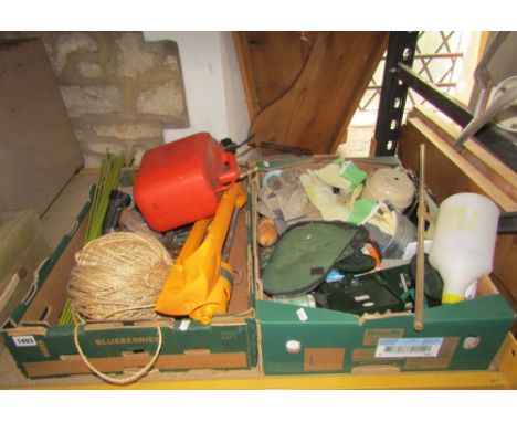 A quantity of miscellaneous garden related items to include small hand tools, hose lock, sprinkler, bundle of bean sticks, et