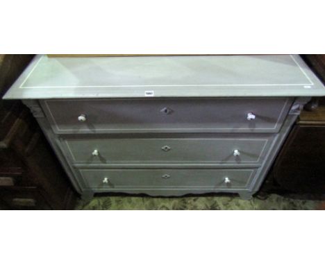 A 19th century three drawer pine commode, with later painted finish, raised on shaped supports