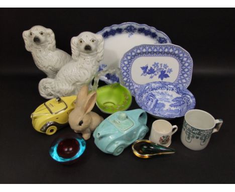 A Sadler tea pot and cover in the form of a turquoise glazed motor racing car, together with a further similar yellow glazed 