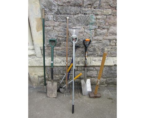 A small collection of contemporary garden hand tools (mainly long handled)