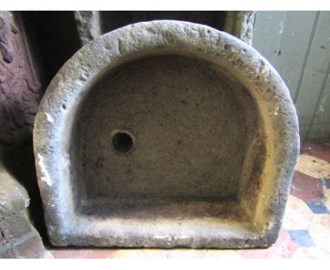 A small natural stone D end trough with circular drainage hole, 56 cm wide x 50 cm deep x 18 cm in height approx