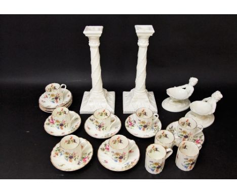 A pair of Royal Worcester white glazed candlesticks in the classical manner with rams head and swag detail and with green pri