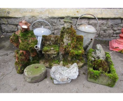 A small weathered trough of rectangular form, 36cm long x 20cm wide x 10cm deep approx, together with four small garden ornam