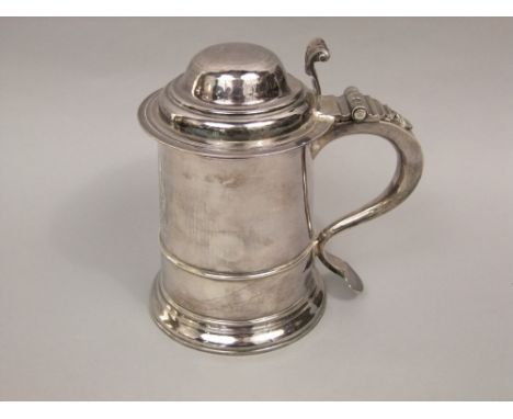 Georgian style silver lidded tankard, with scrolled thumb piece and 'S' scroll handle, engraved with a crest of a rampant dog