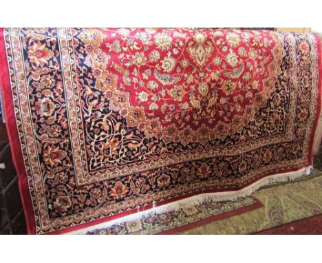 Modern Keshan type carpet on a red ground, 280 x 200 cm
