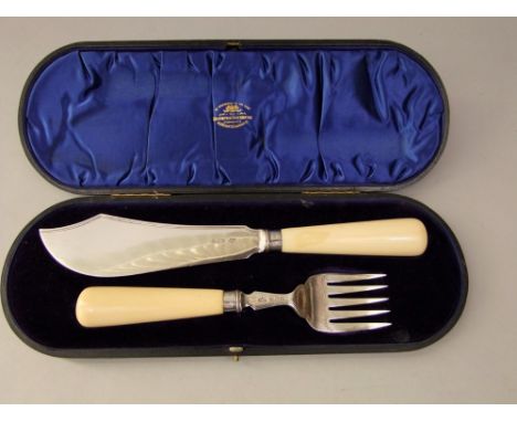 Cased Goldsmiths & Silversmiths company bone handled silver fish serving set comprising knife and fork, with further silver c