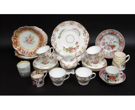 A collection of 19th century tea wares with painted floral sprays and gilt border decoration comprising a pair of cake plates