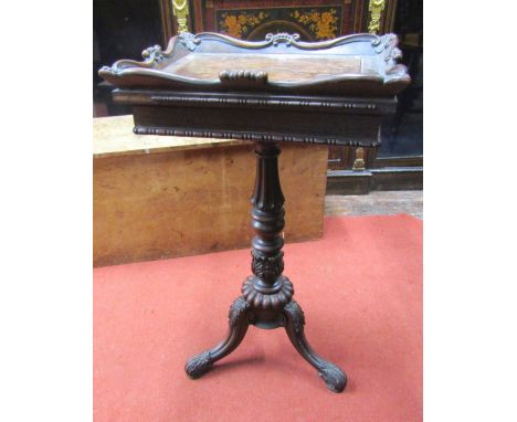 A regency rosewood planter or jardiniere stand, in rose wood with rectangular top and with scrolled and shell moulded borders