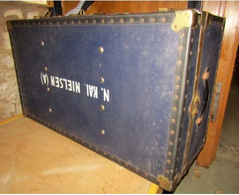 A blue painted fibre cabin trunk with simulated brass fittings, together with a further case housed within