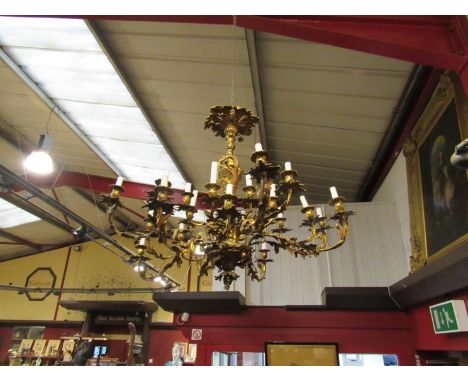 A 19th Century Rococo 24 branch bronze chandelier, foliate form 