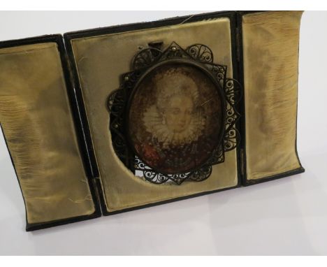 An antique hand painted miniature of an Elizabethan lady in original pierced metal and seed pearl frame, cased  