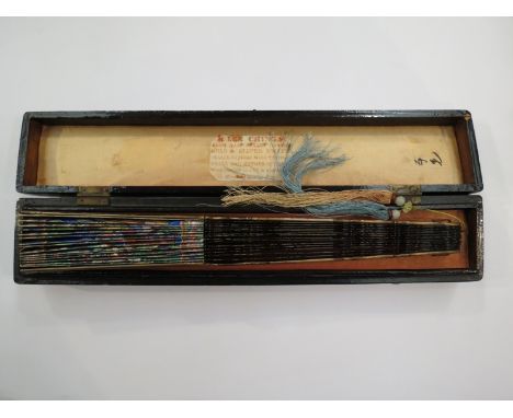 An Oriental hand painted fan, chinoiserie stick ends in associated box, 28cm high
