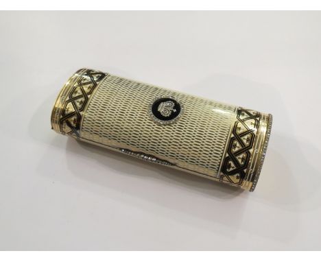 In the manner of Cartier / Van Cleef: An early 20th Century onyx, enamel and diamond vanity case, yellow metal body set with 