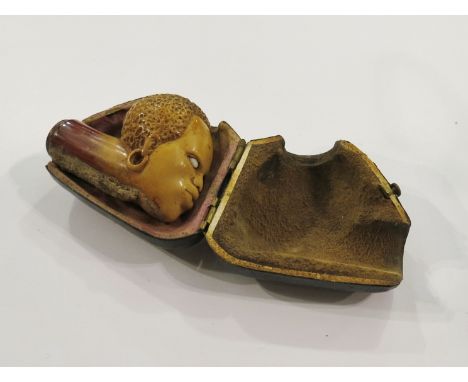 A late 19th/early 20th Century meerschaum pipe bowl and shank of African head form 