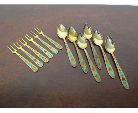 A set of six teaspoons and forks marked 875 with enamel embellishment  