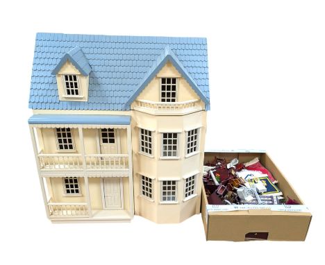 Modern three storey dolls house, with a collection of dolls house furniture, including unopened light fittings, kitchen acces