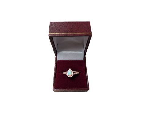Silver-gilt opal and cubic zirconia ring, stamped, boxedCondition Report:Size T-U