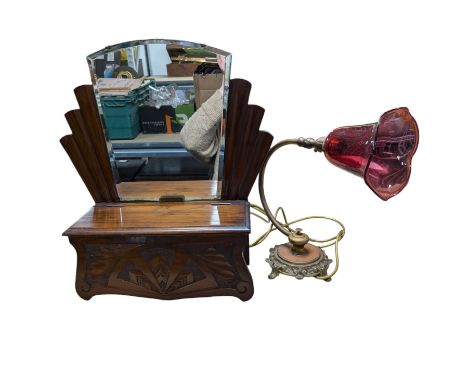 Early 20th century brass adjustable reading lamp, with cranberry shade and a carved wooden Art Deco style mirror with box in 