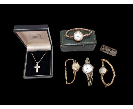9ct gold ladies manual wind wristwatch, on a 9ct gold spring loaded expanding strap, two 9ct gold cased ladies manual wind wr