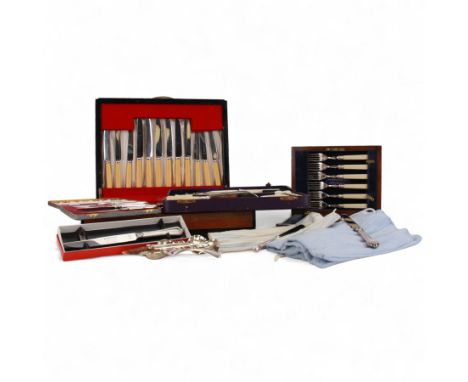 Matched canteen of silver plated cutlery, cased, set of six silver-plated fish knives and forks, in a mahogany and brass inla