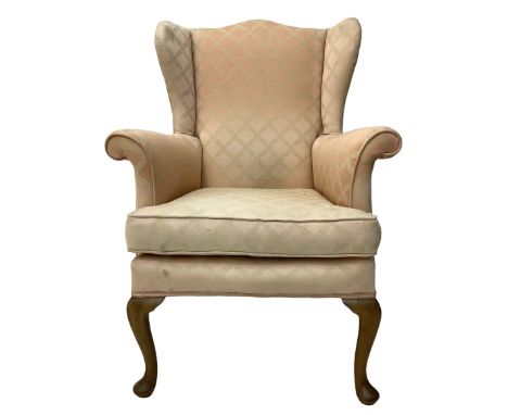 Parker Knoll - 20th century wing back armchair, upholstered in light pink fabric with gold trim, on cabriole supportsDimensio