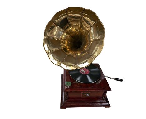 His Master's Voice table top gramophone on a wooden base, with brass horn and a collection of records