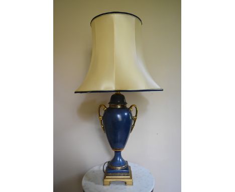 A Classical style painted metal table lamp in the shape of a twin handled lidded urn. H.87 W.23cm 