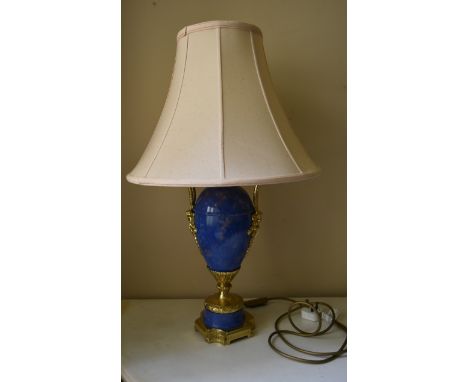 A painted metal faux stone and gilt table lamp in the style of a Classical urn. H.60cm W.20cm 