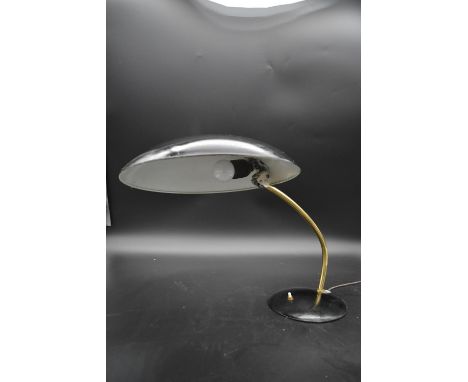 A vintage metal and brass desk lamp with flying saucer shade. H.35 W.50cm Dia.32cm 