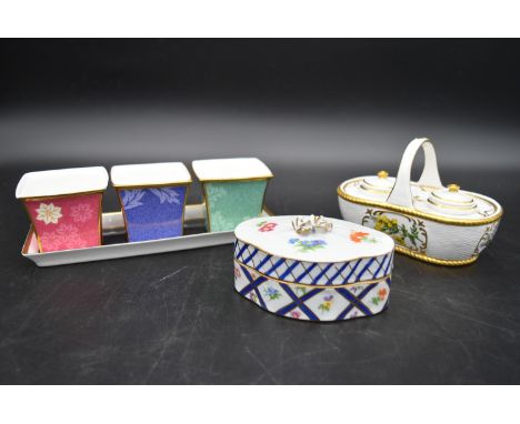 A Continental porcelain hand gilded and decorated lidded caddy, a twin lidded Spode basket and a set of three Wedgwood miniat