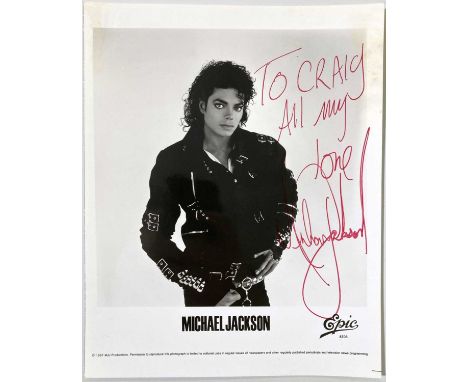 A promotional 1987 8 x 10" photograph signed with an inscription in red ink by Michael Jackson .Authenticated by Roger Eppers