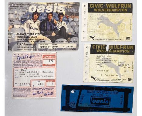 Five c 1990s Oasis ticket stubs to include: Maine Rd (inc a coach ticket), Wulfrun Hall (x2), Edwards 1994.