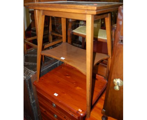 An Edwardian mahogany card table, the rectangular fold-over top revealing baize lined playing surface on square tapering supp